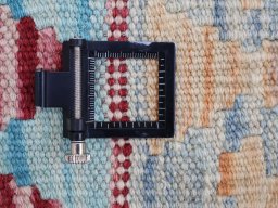 Corner detail of New Modern Design rug showing border pattern and Wool pile