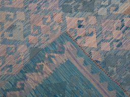 Surface texture of New Modern Design rug with natural Wool and intricate pattern