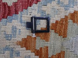 Corner detail of New Modern Design rug showing border pattern and Wool pile