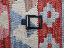 Corner detail of New Modern Design rug showing border pattern and Wool pile
