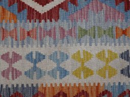 Backside of handmade New Modern Design rug showing knot structure and weave density