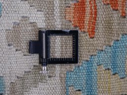 Corner detail of New Modern Design rug showing border pattern and Wool pile