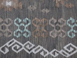 Backside of handmade New Modern Design rug showing knot structure and weave density