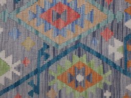 Backside of handmade New Modern Design rug showing knot structure and weave density