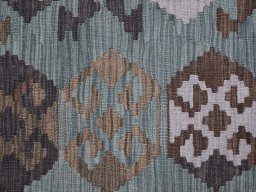 Backside of handmade New Modern Design rug showing knot structure and weave density
