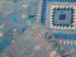 Surface texture of New Modern Design rug with natural Wool and intricate pattern