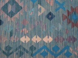 Backside of handmade New Modern Design rug showing knot structure and weave density