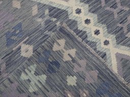 Surface texture of New Modern Design rug with natural Wool and intricate pattern