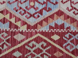 Backside of handmade New Modern Design rug showing knot structure and weave density