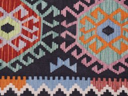 Backside of handmade New Modern Design rug showing knot structure and weave density