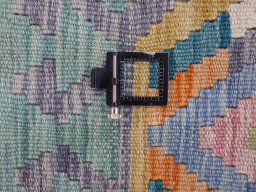Corner detail of New Modern Design rug showing border pattern and Wool pile
