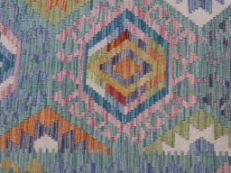 Backside of handmade New Modern Design rug showing knot structure and weave density