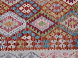 Backside of handmade New Modern Design rug showing knot structure and weave density