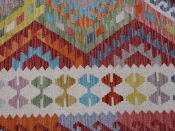 Backside of handmade New Modern Design rug showing knot structure and weave density