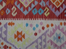 Backside of handmade New Modern Design rug showing knot structure and weave density