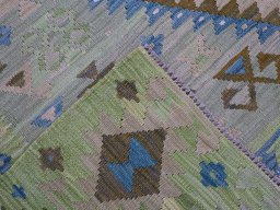 Surface texture of New Modern Design rug with natural Wool and intricate pattern