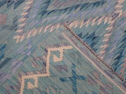 Surface texture of New Modern Design rug with natural Wool and intricate pattern