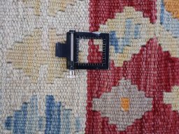 Corner detail of New Modern Design rug showing border pattern and Wool pile