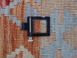 Corner detail of New Modern Design rug showing border pattern and Wool pile