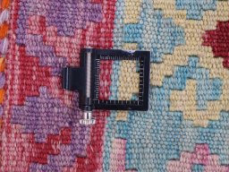 Corner detail of New Modern Design rug showing border pattern and Wool pile