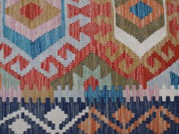Backside of handmade New Modern Design rug showing knot structure and weave density