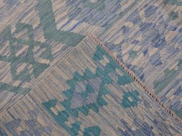 Surface texture of New Modern Design rug with natural Wool and intricate pattern