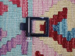 Corner detail of New Modern Design rug showing border pattern and Wool pile
