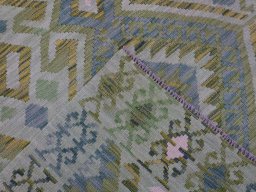 Surface texture of New Modern Design rug with natural Wool and intricate pattern