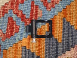 Corner detail of New Modern Design rug showing border pattern and Wool pile