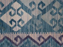 Backside of handmade New Modern Design rug showing knot structure and weave density