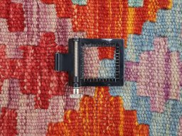 Corner detail of New Modern Design rug showing border pattern and Wool pile