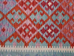 Backside of handmade New Modern Design rug showing knot structure and weave density