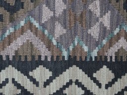 Backside of handmade New Modern Design rug showing knot structure and weave density