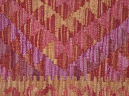 Backside of handmade New Modern Design rug showing knot structure and weave density