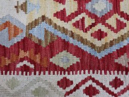 Backside of handmade New Modern Design rug showing knot structure and weave density