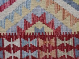 Backside of handmade New Modern Design rug showing knot structure and weave density