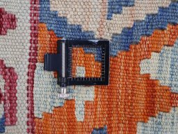 Corner detail of New Modern Design rug showing border pattern and Wool pile