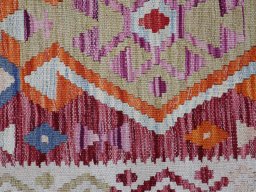 Backside of handmade New Modern Design rug showing knot structure and weave density