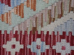 Backside of handmade New Modern Design rug showing knot structure and weave density