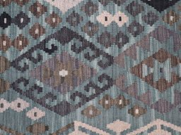 Backside of handmade New Modern Design rug showing knot structure and weave density
