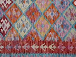 Backside of handmade New Modern Design rug showing knot structure and weave density