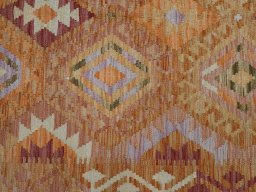 Backside of handmade New Modern Design rug showing knot structure and weave density