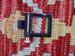 Corner detail of New Modern Design rug showing border pattern and Wool pile