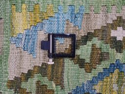 Corner detail of New Modern Design rug showing border pattern and Wool pile