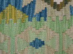 Backside of handmade New Modern Design rug showing knot structure and weave density