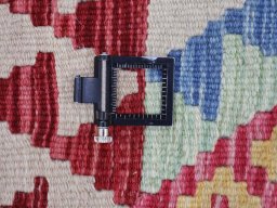 Corner detail of New Modern Design rug showing border pattern and Wool pile