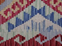 Backside of handmade New Modern Design rug showing knot structure and weave density