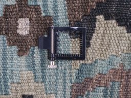 Corner detail of New Modern Design rug showing border pattern and Wool pile