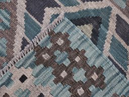 Surface texture of New Modern Design rug with natural Wool and intricate pattern