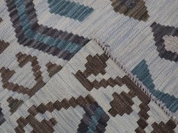 Surface texture of New Modern Design rug with natural Wool and intricate pattern